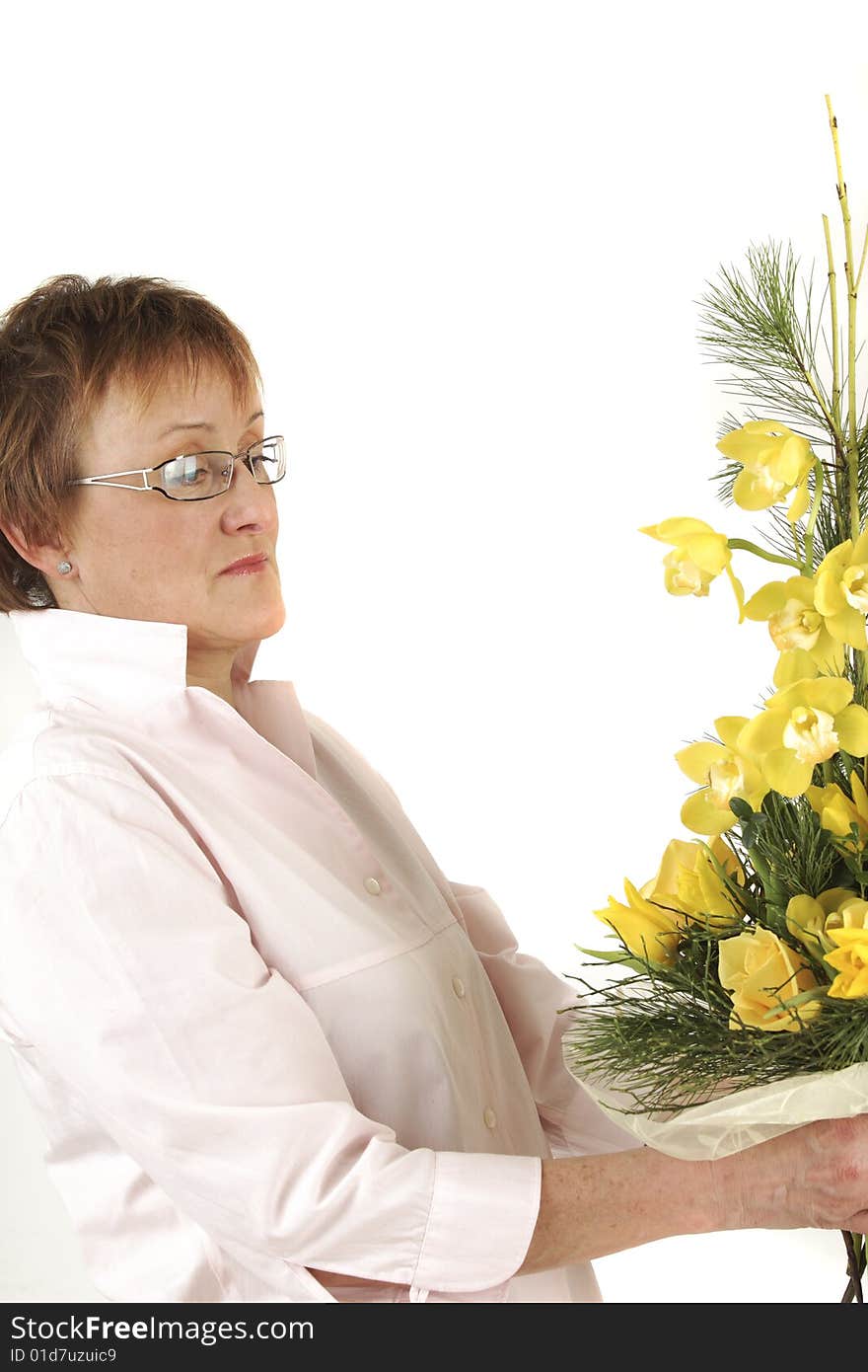 Elderly woman is preparing flower for Valentine's. Elderly woman is preparing flower for Valentine's