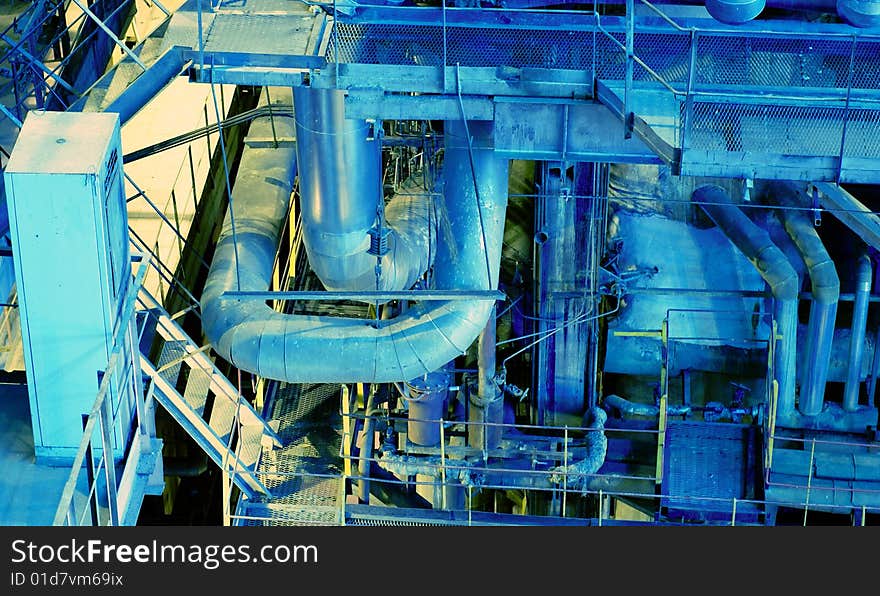 Pipes, tubes, machinery and steam turbine at a power plant