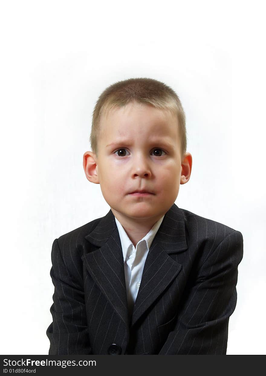 Boy in business cloth on white background