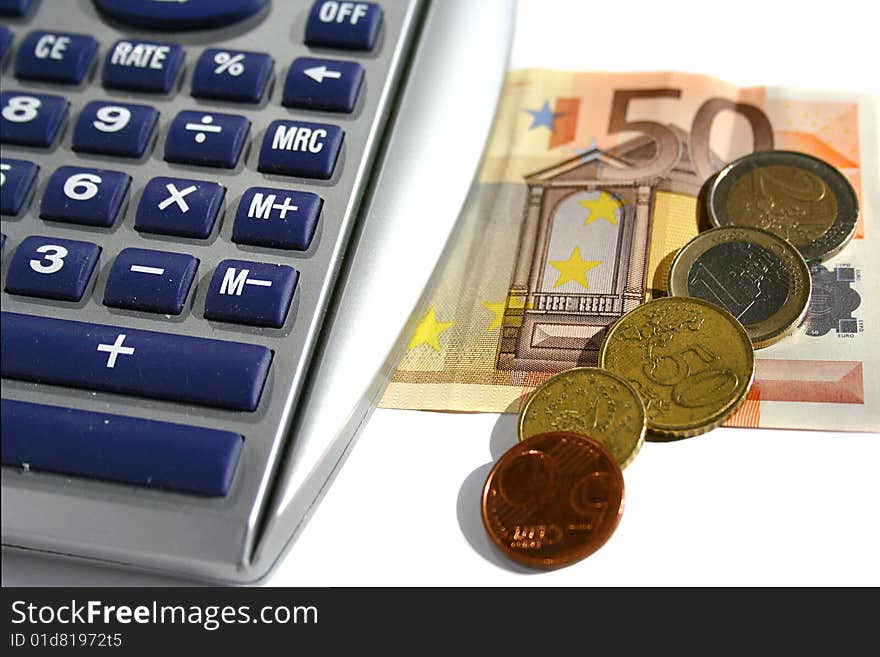 An image of euros and a calculator. An image of euros and a calculator