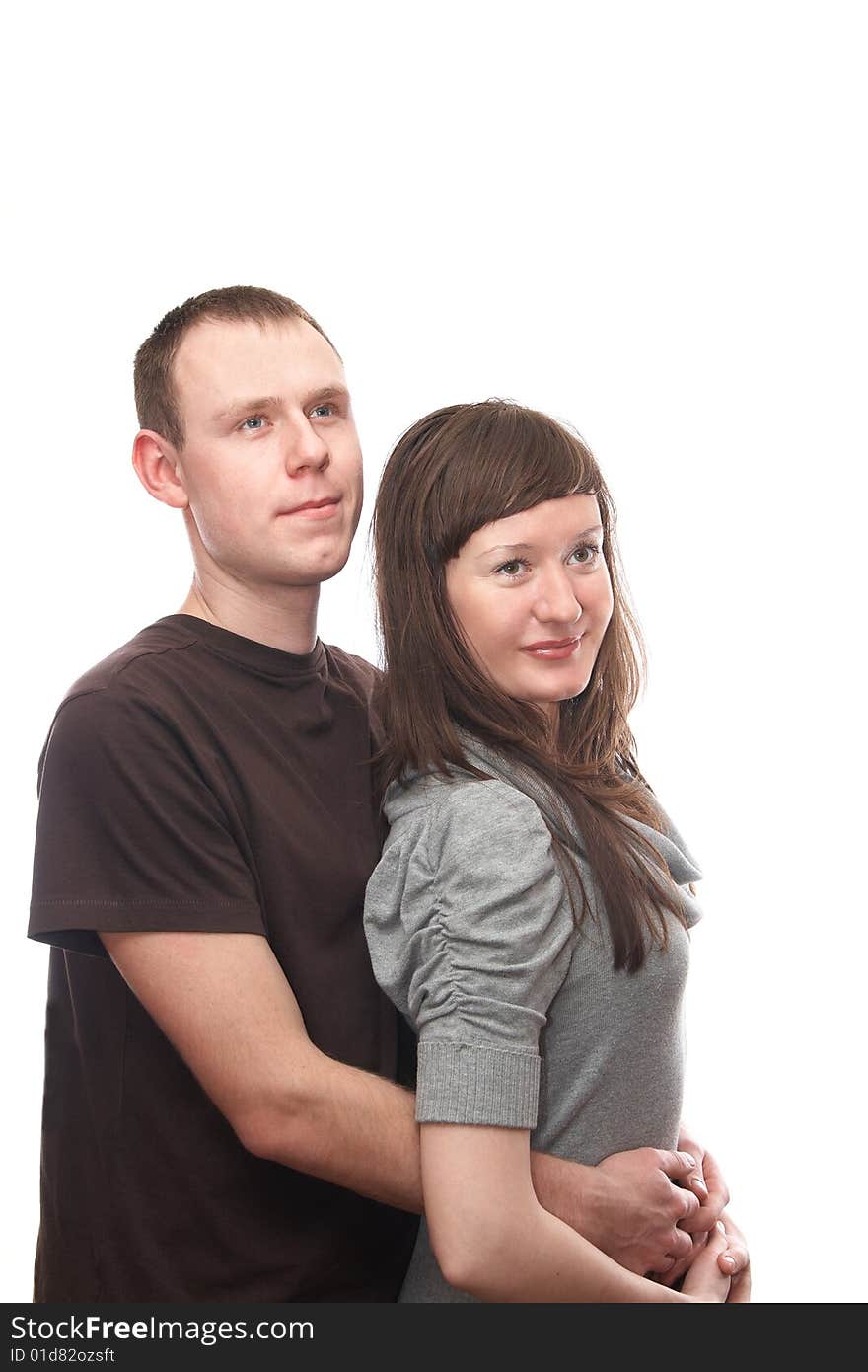 Young man and  young woman on the white background. Young man and  young woman on the white background