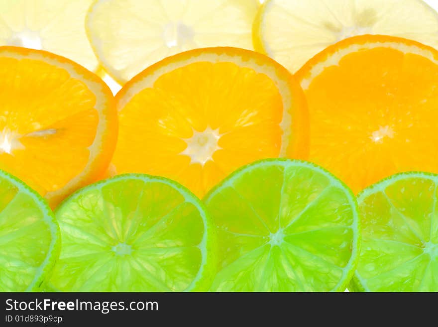 Background from citrus fruits, lime, orange and lemon. Background from citrus fruits, lime, orange and lemon