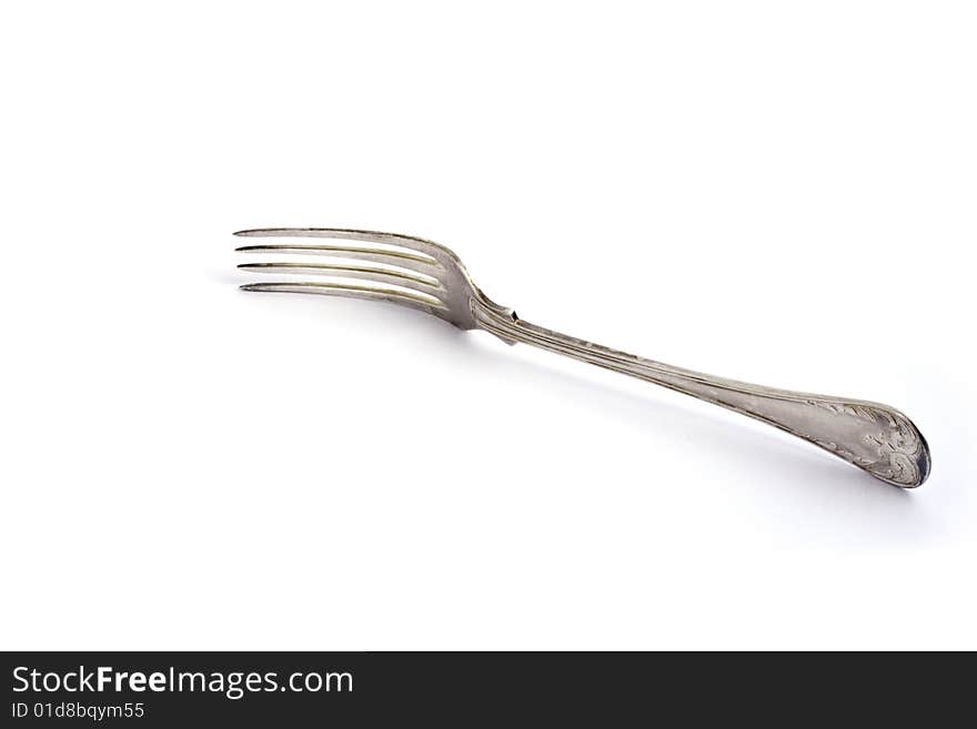 Aged silver fork