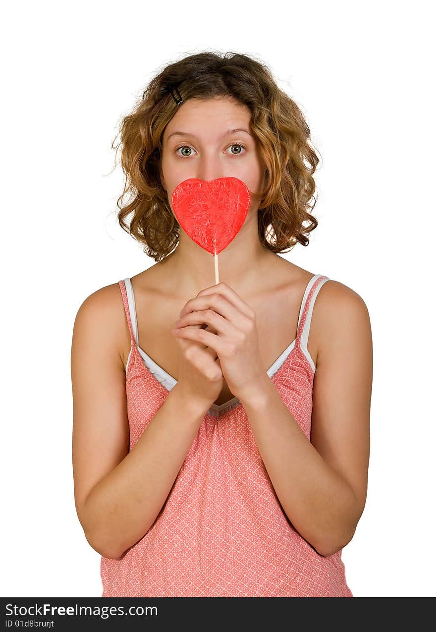 Young beautiful  girl  with  red lollypop in hand. Young beautiful  girl  with  red lollypop in hand