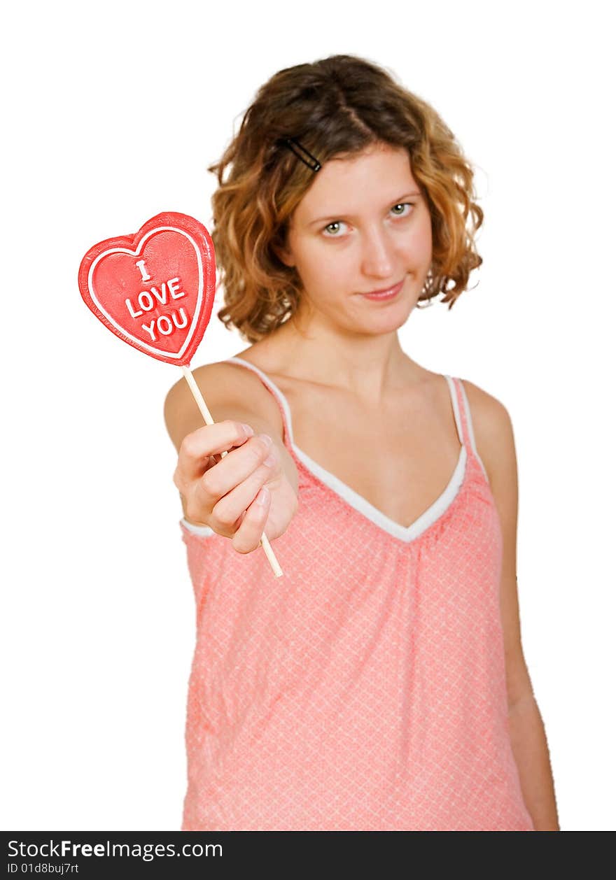 Girl with red heart shaped candy