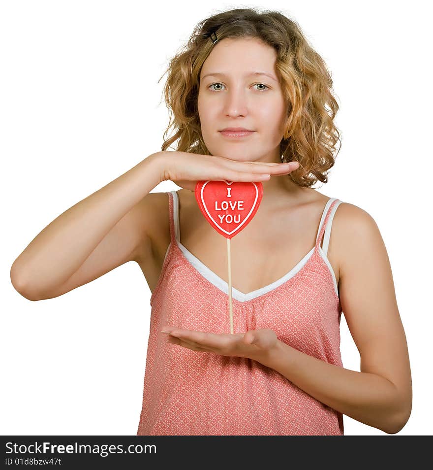 Girl with red heart shaped candy