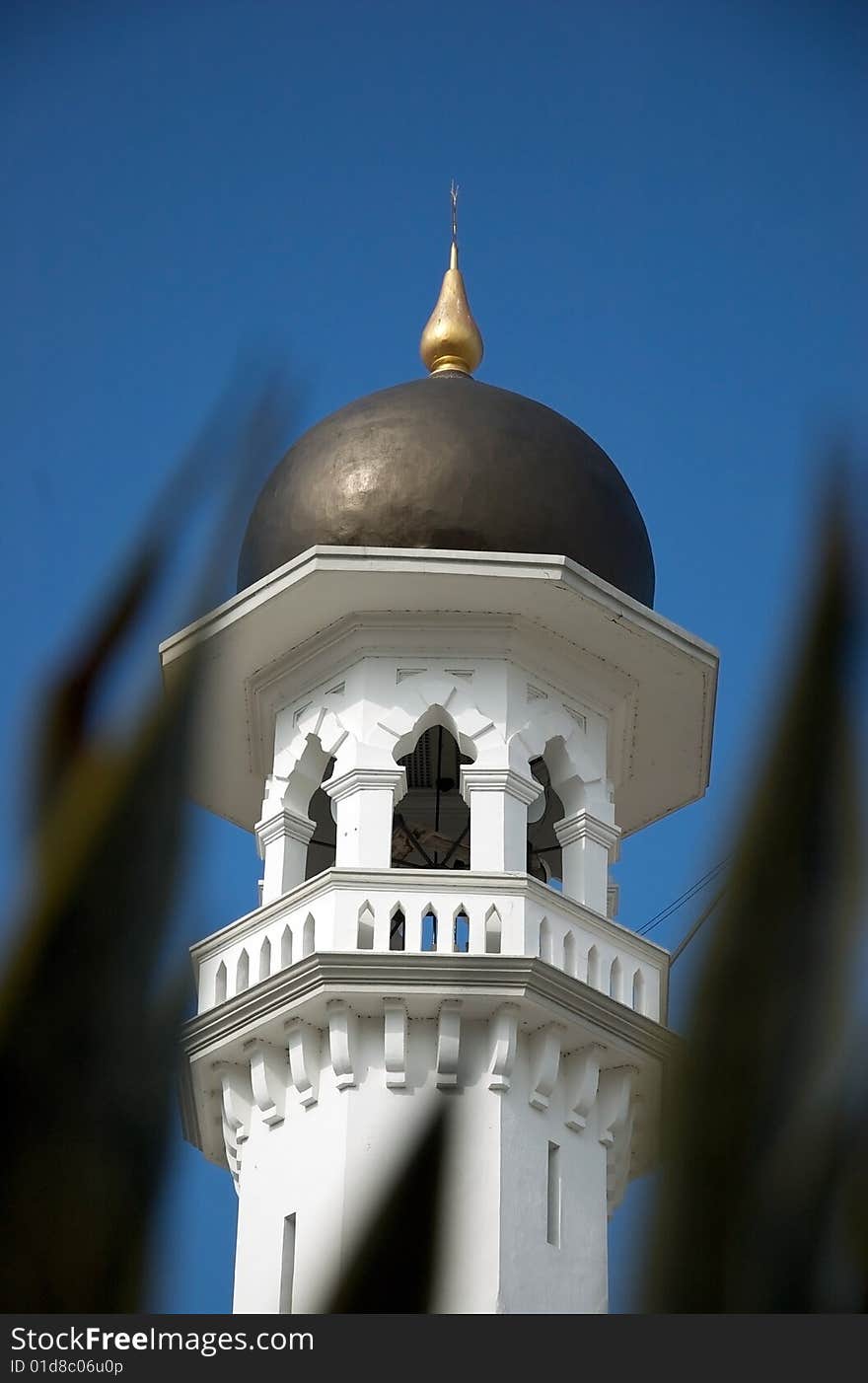 Mosque building top with blue sky as background