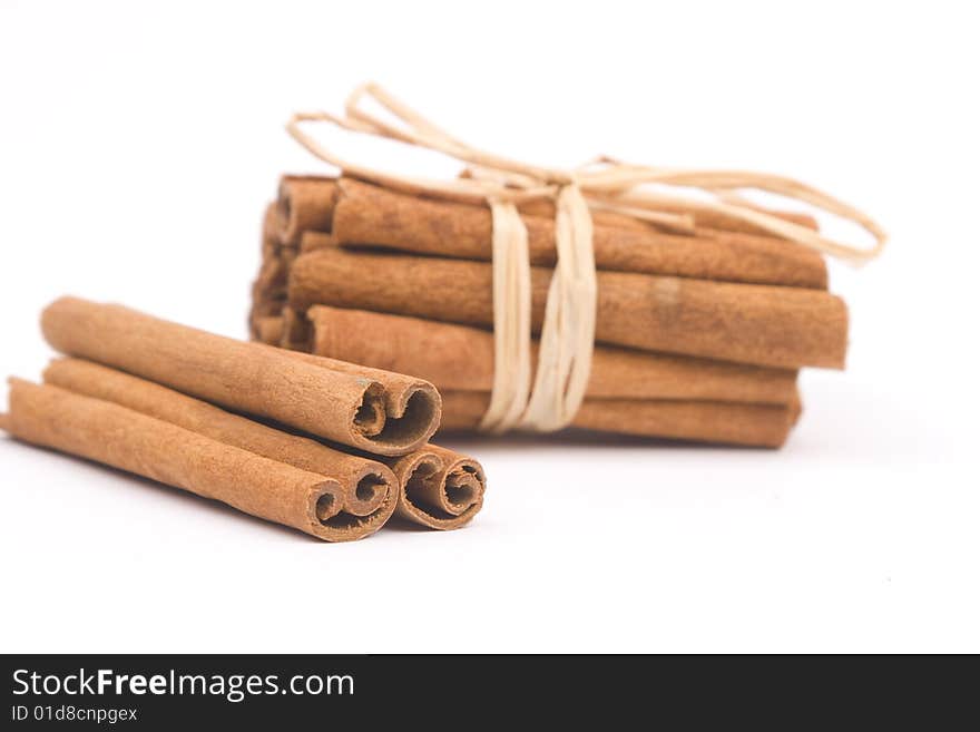 Cinnamon sticks isolated on white background. Cinnamon sticks isolated on white background