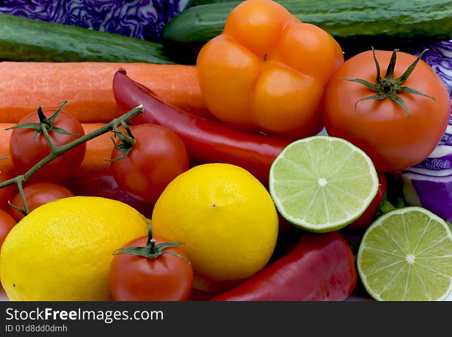 Bright lemons, tomatoes, pepper and cabbage. Bright lemons, tomatoes, pepper and cabbage