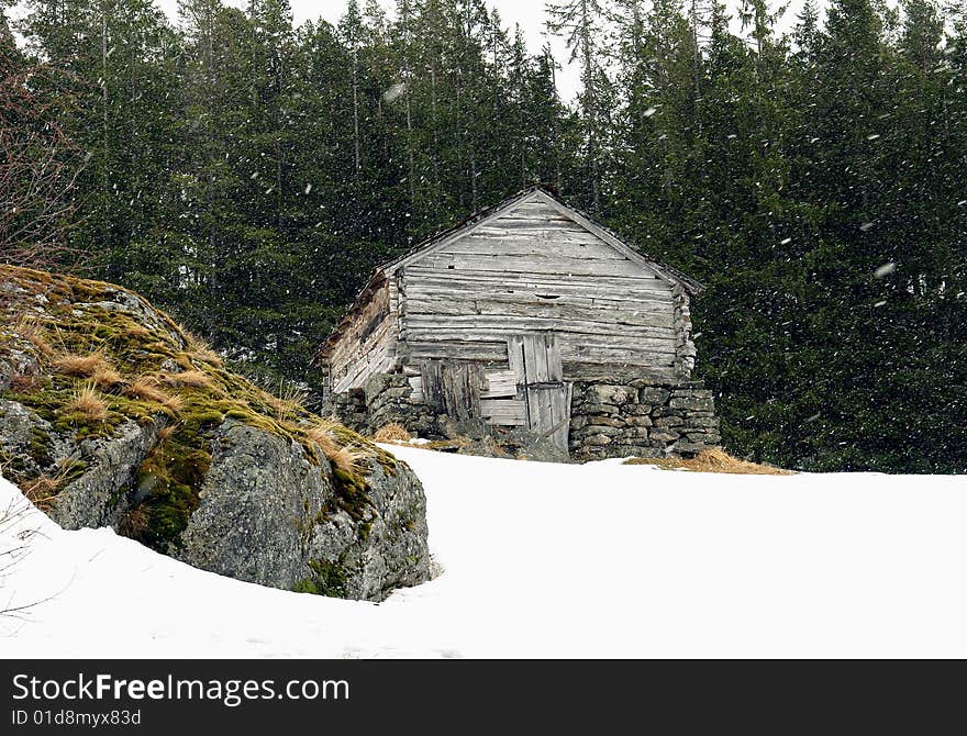 Norway tipical rural hut and mountain lanscape