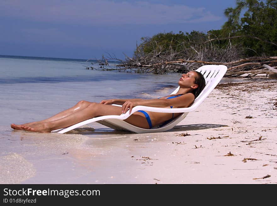 Woman relaxing on the beach