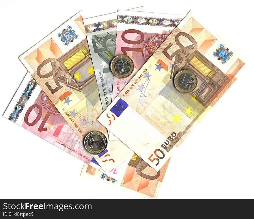 Euro coins and banknotes isolated over white