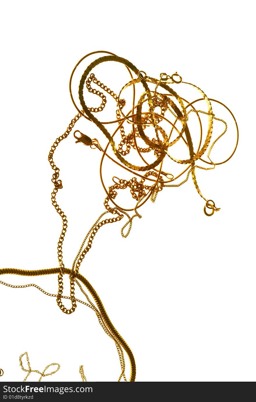 Gold chains in form female figure