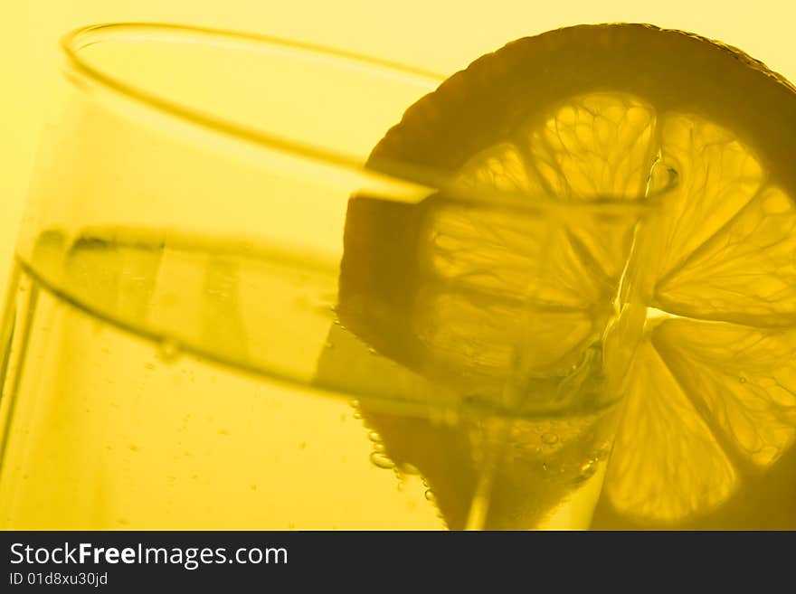 Close Up Picture Of Slice Lemon In Glass