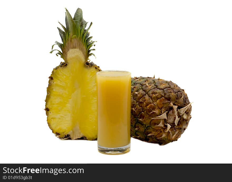 Glass juice and pineapples isolated on the white. Glass juice and pineapples isolated on the white