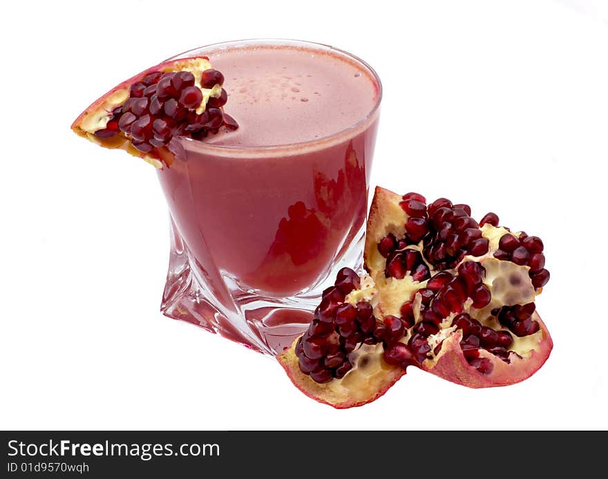 Glass of pomegranate juice and pomegranate grain isolated on a white background. Glass of pomegranate juice and pomegranate grain isolated on a white background