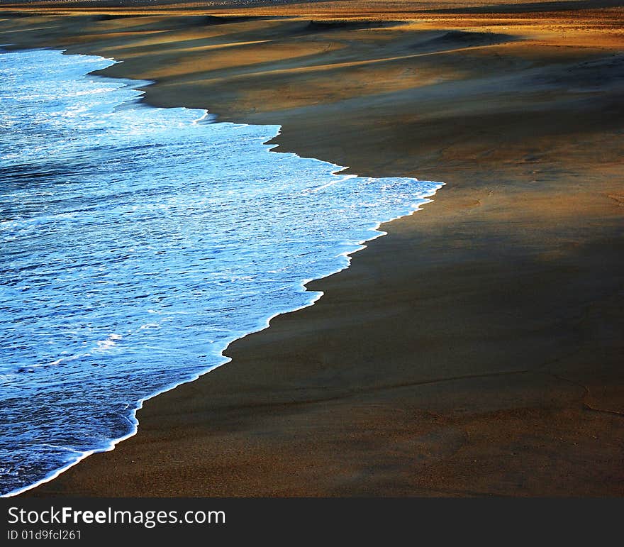 Where water meets sand,the beach of Nazare in details. Where water meets sand,the beach of Nazare in details