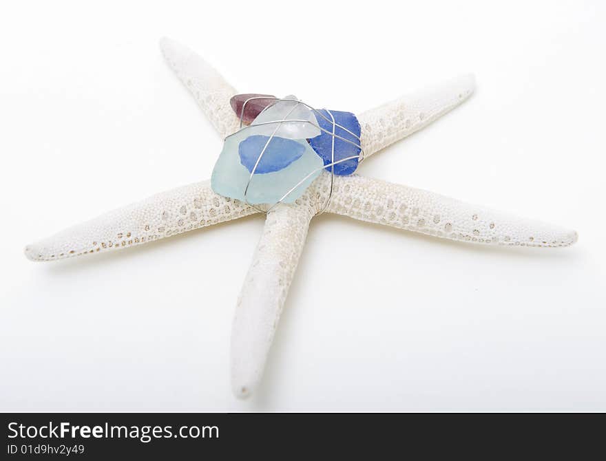 Starfish with sea glass and silver wire. Starfish with sea glass and silver wire