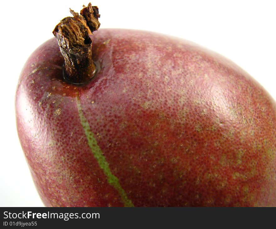 Closeup of a red d'anjou pear on a white background. Closeup of a red d'anjou pear on a white background