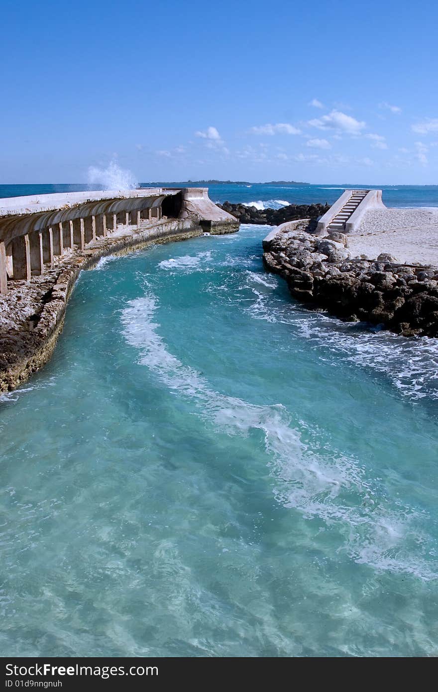 Ocean waves crashing on sea wall