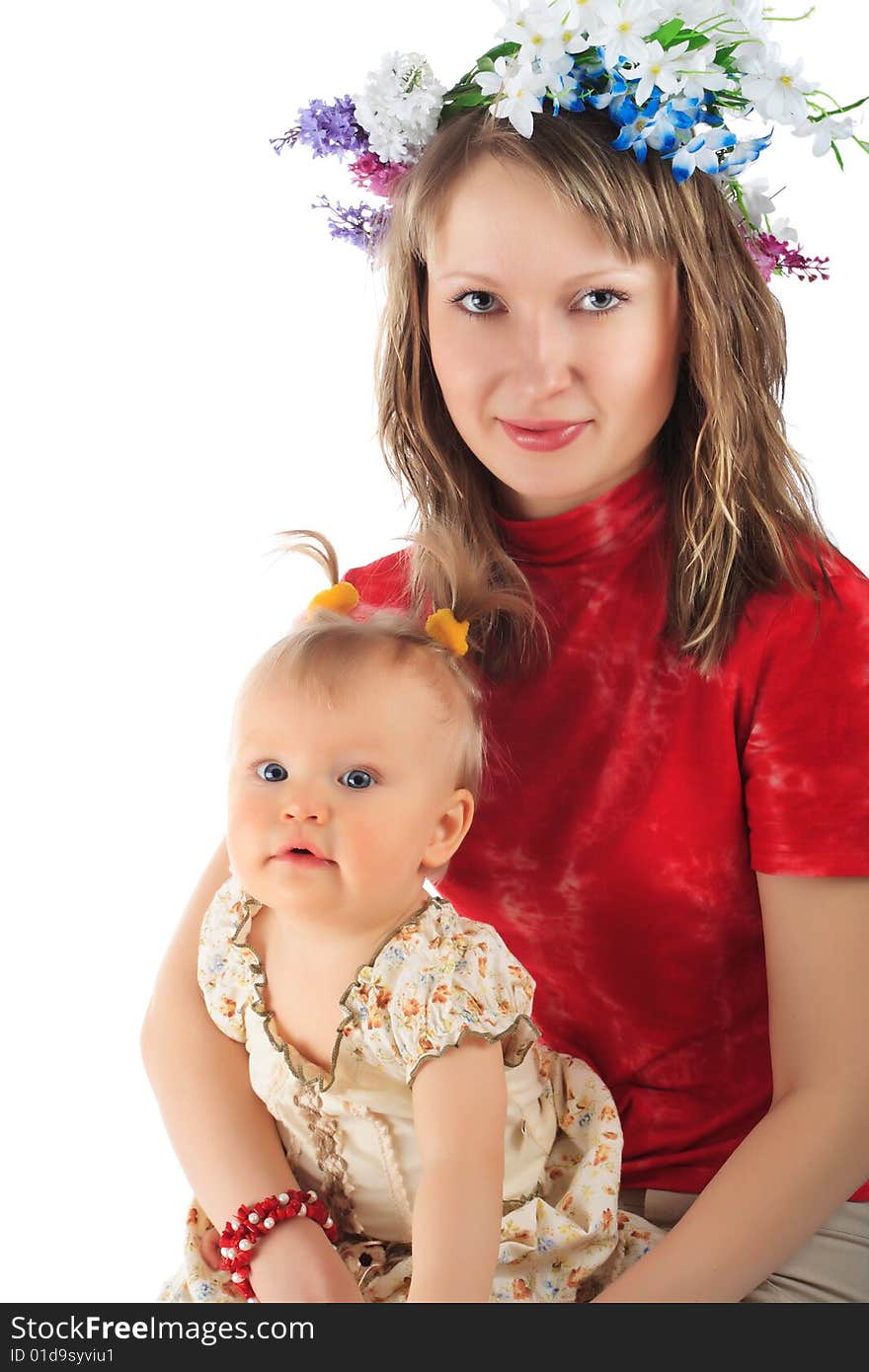 Beautiful baby with mother. Shot in studio. Isolated on white. Beautiful baby with mother. Shot in studio. Isolated on white.