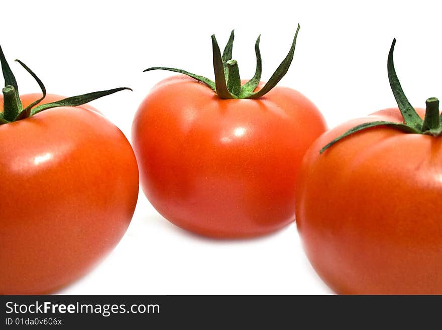 Tomato on a white background. Tomato on a white background