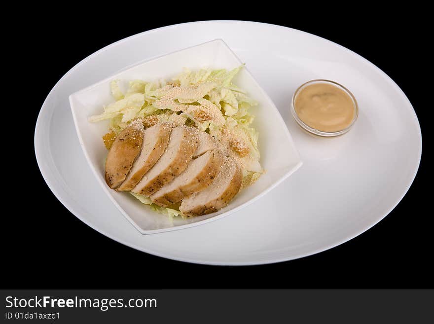 Meat With Vegetables Over Black Background