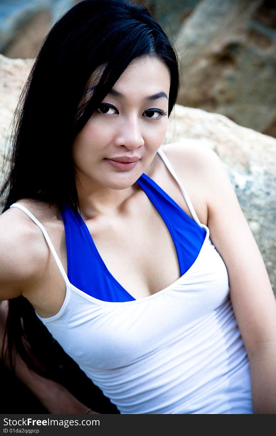 Asian woman relaxing on the outdoor