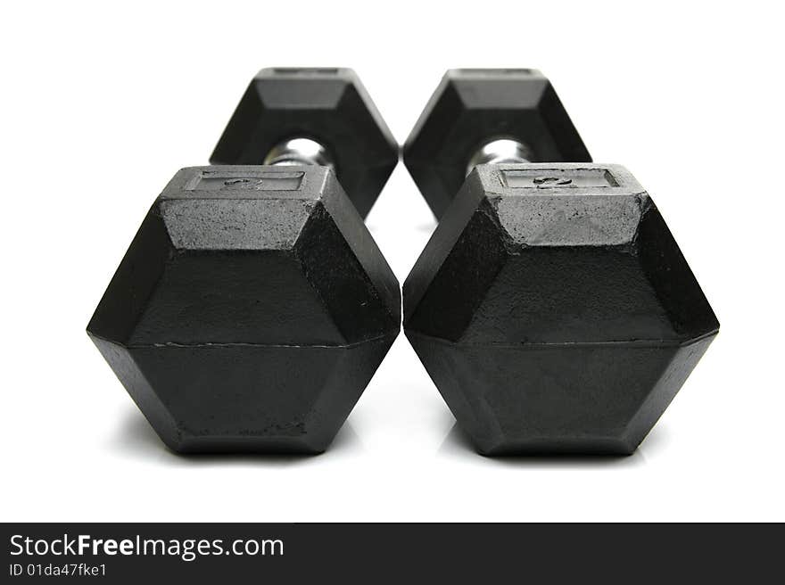 Weight lifting dumbbells isolated against a white background