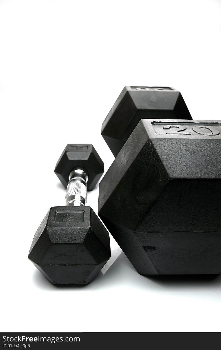 Weight lifting dumbbells isolated against a white background