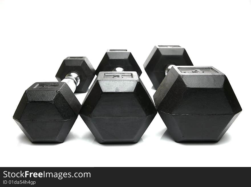 Weight lifting dumbbells isolated against a white background