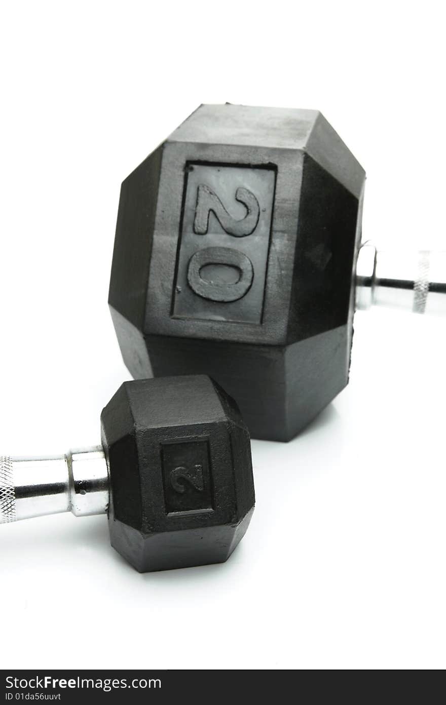 Weight lifting dumbbells isolated against a white background