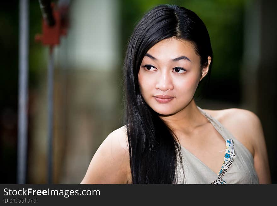 Asian woman relaxing on the outdoor