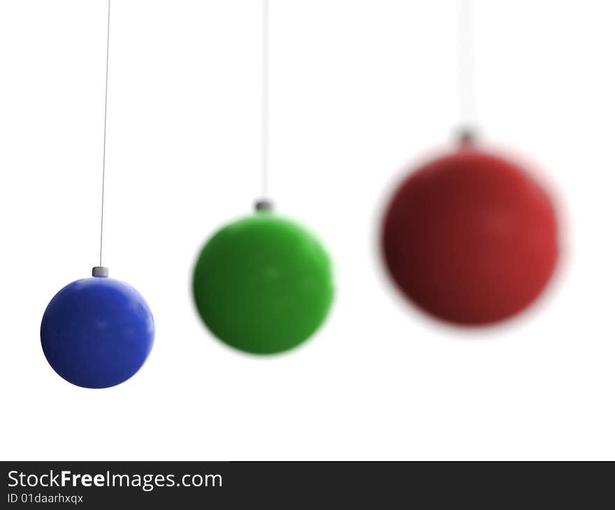 Three Christmas toys of blue, green and red color with last one in focus hanging on white background. Three Christmas toys of blue, green and red color with last one in focus hanging on white background