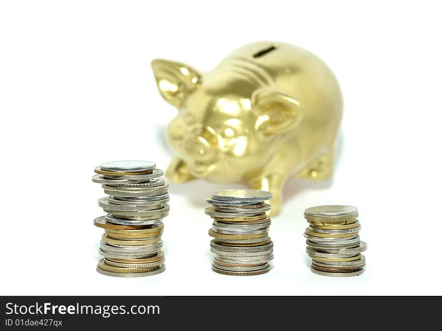 Piggy bank  isolated on white background with coins. Piggy bank  isolated on white background with coins