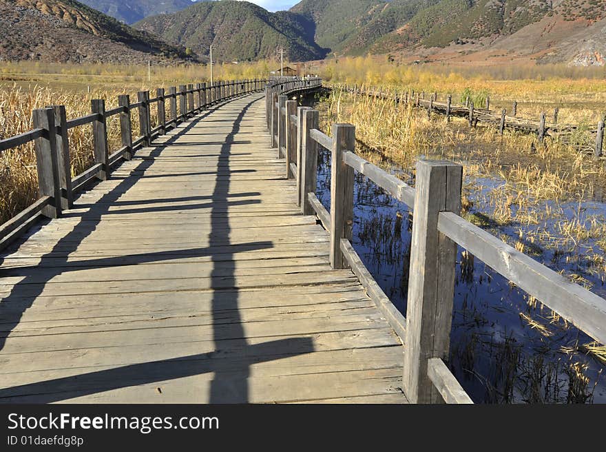 The wooden bridge of  meandering bend