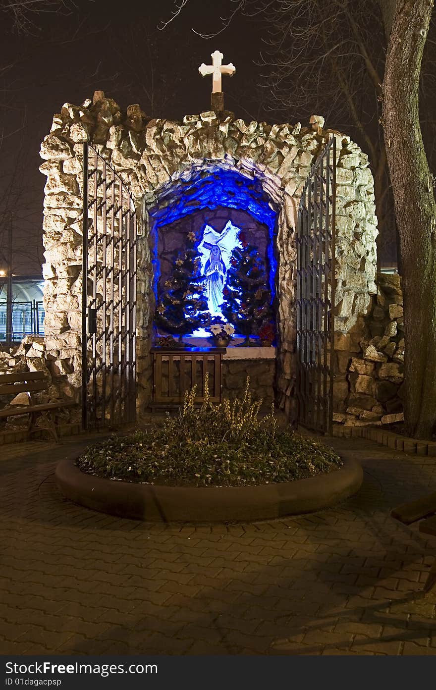 Religious monument somewhere in Poland by night