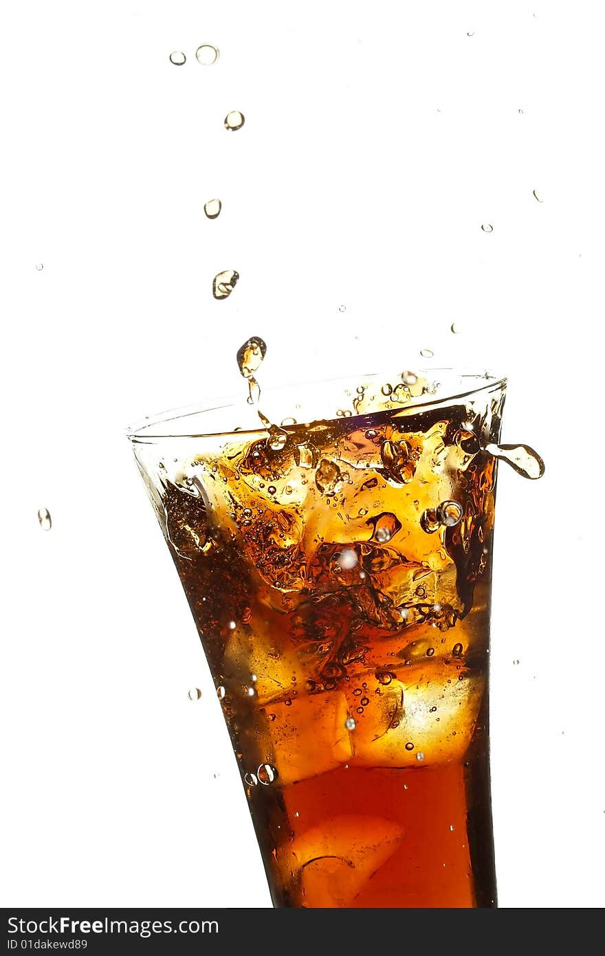 Glass with cola and ice on the white background