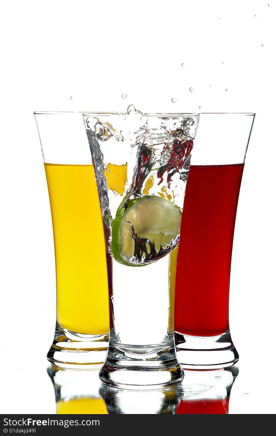 Glasses with juice and lime