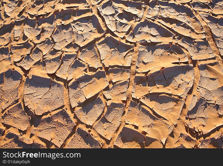 Cracked ground in Sahara desert region