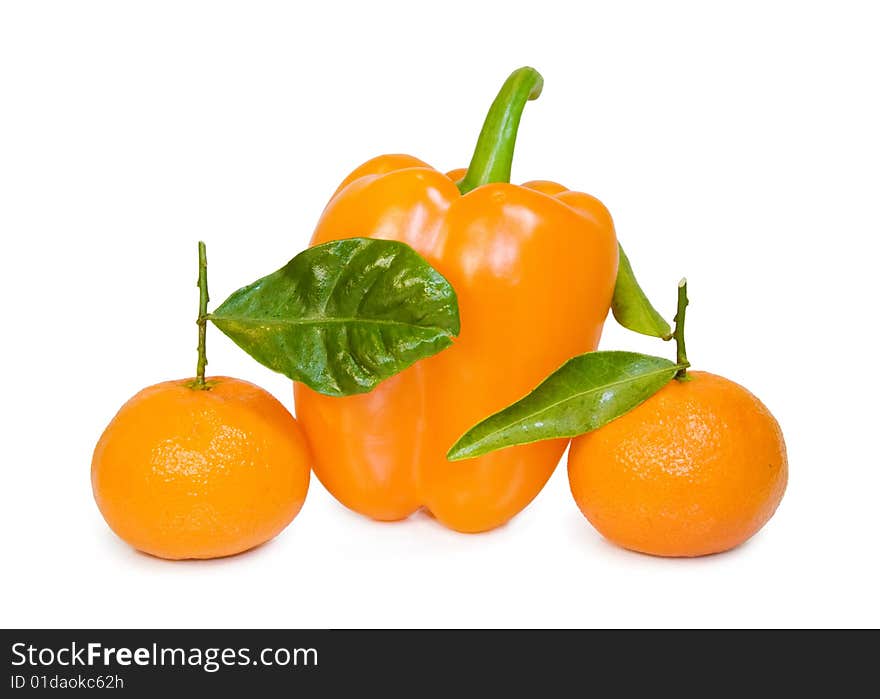 Orange pepper and clementines over white with clipping path. Orange pepper and clementines over white with clipping path