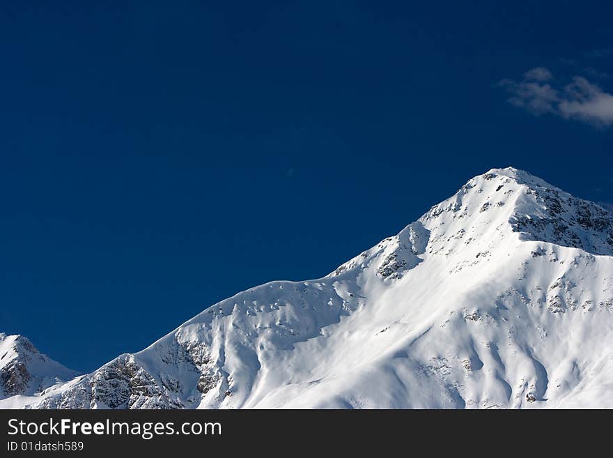 Glacier in the winter mountains.