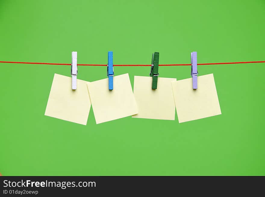 Paper Blanks Hanging on a Rope Held By Clothespins