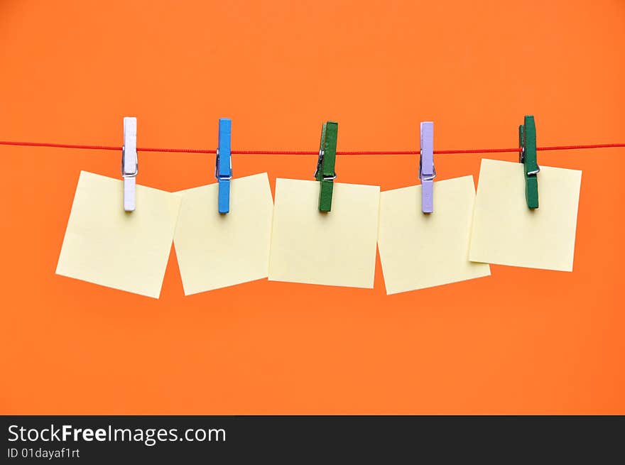 Paper Blanks Hanging on a Rope Held By Clothespins