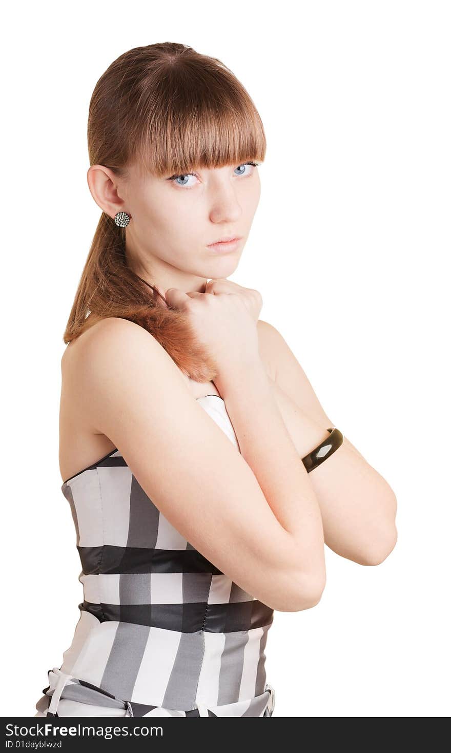 Young girl is holding her hands together on white background