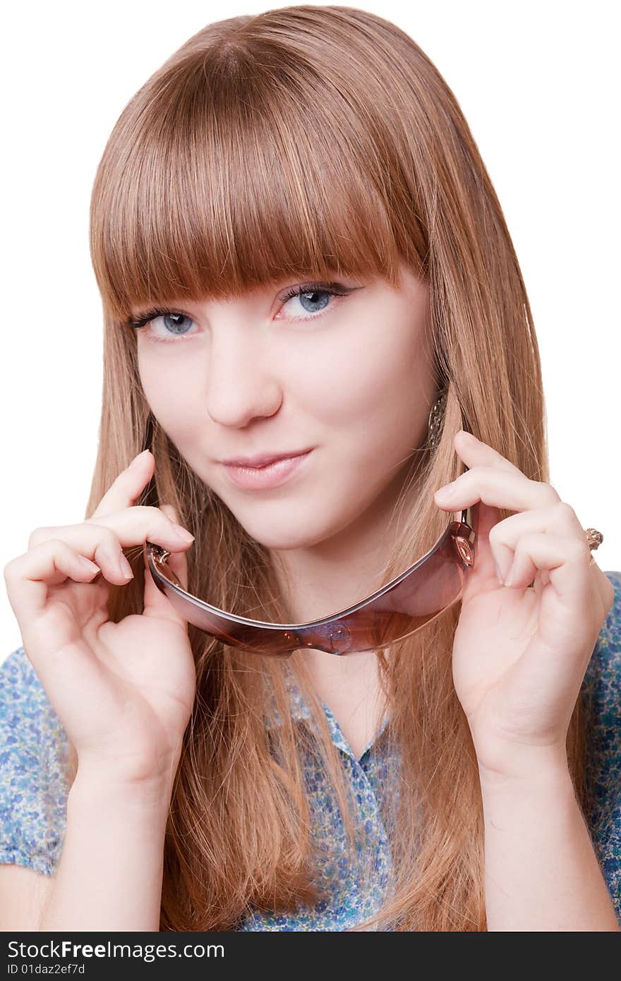 Young beautiful girl in blue blouse with sun glasses