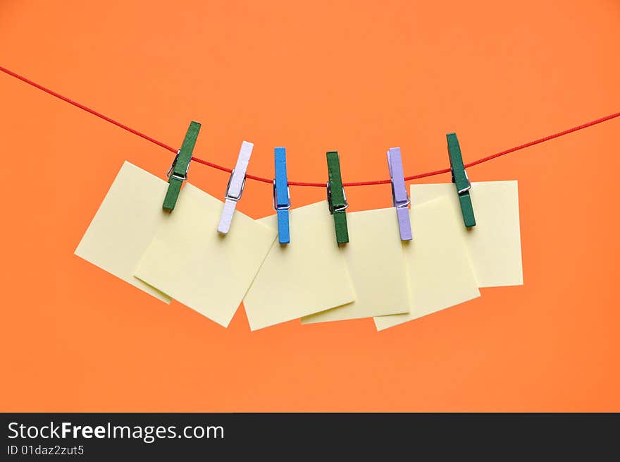 Paper Blanks Hanging on a Rope Held By Clothespins