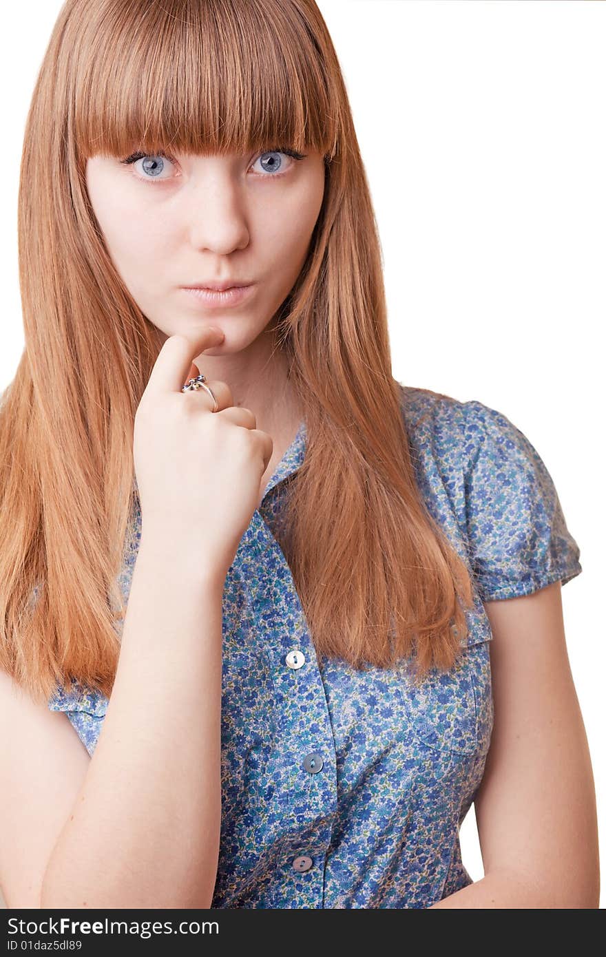 Young beautiful pensive girl on white background