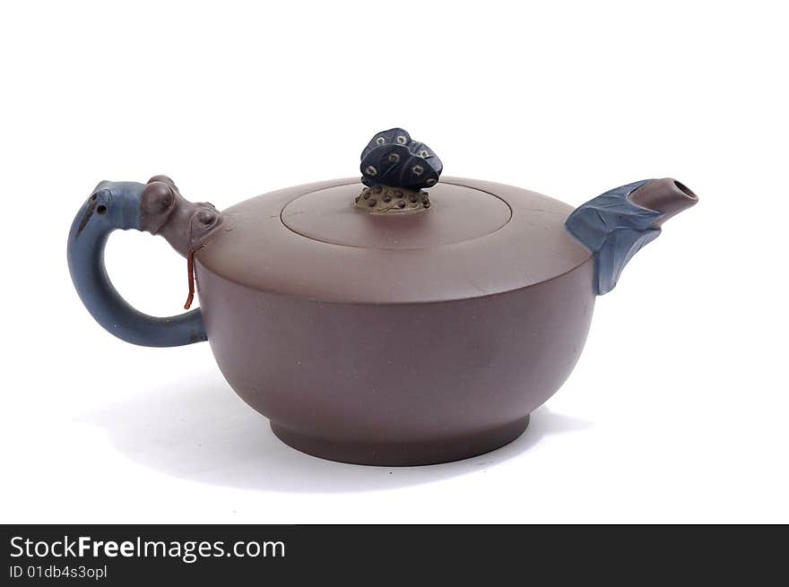 Isolated clay teapot on white background