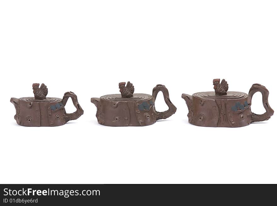 Isolated clay teapot on white background